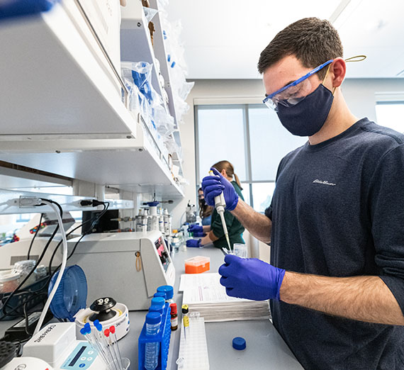 Student working in a bio lab